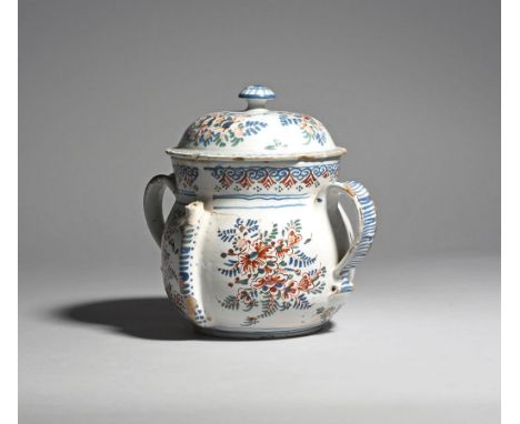 A delftware posset pot and cover  c.1720-30, London or Bristol, the tall body painted in red, blue and green with sprays of O