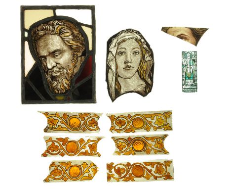 A leaded stained glass panel, 19th century, possibly John the Baptist, the one piece face picked out in monochrome, and heigh