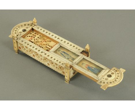 A prisoner of war carved bone box containing dominoes, early 19th century, the sliding lid with two full length watercolour p
