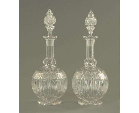 A pair of Victorian hobnail cut and faceted decanters, each with stopper.  Height 36.5 cm.    CONDITION REPORT:  One decanter