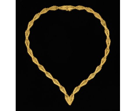 A gold coloured metal necklace, stamped "18 k", 32 grams (see illustration).