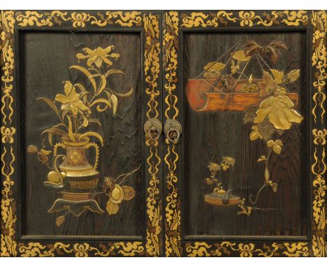 A Japanese Kazaridana, Meiji period, each door and panel finely lacquered with lotus flowers in high and low relief, cranes, 