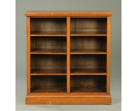A Victorian oak open bookcase, with moulded edge, above two tiers of adjustable shelves, raised on a plinth base, width 110 c