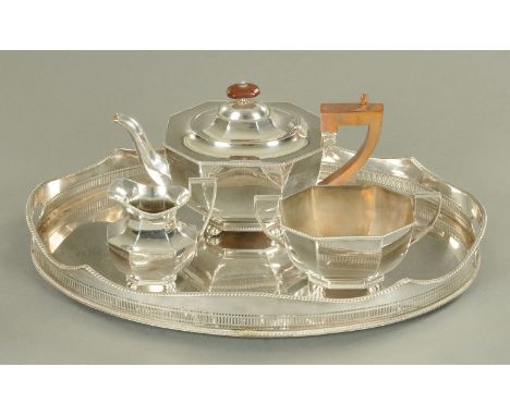 A three piece silver plated tea service, and an oval galleried tray.