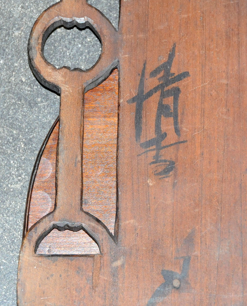 A set of three Japanese carved and stained wood wall brackets, late