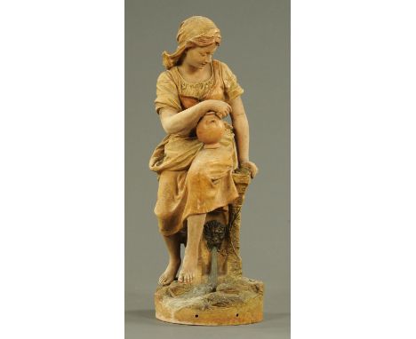 A French terracotta figure of a young female, 19th century, modelled  seated upon a water fountain and holding a jar in her l