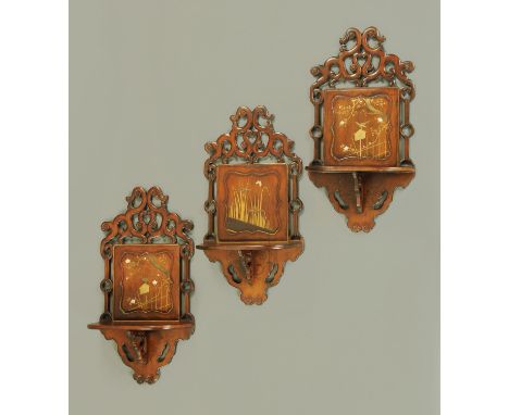 A set of three Japanese carved and stained wood wall brackets, late 19th century, two with relief lacquer and Shibayama type 