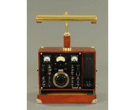 A Steam Punk inspired desk lamp, created from an early 20th century electrical transmitter/gauge, with adjustable brass readi