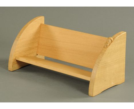 A Mouseman Thompson of Kilburn oak book trough, with typical mouse trademark. Width 45 cm. 