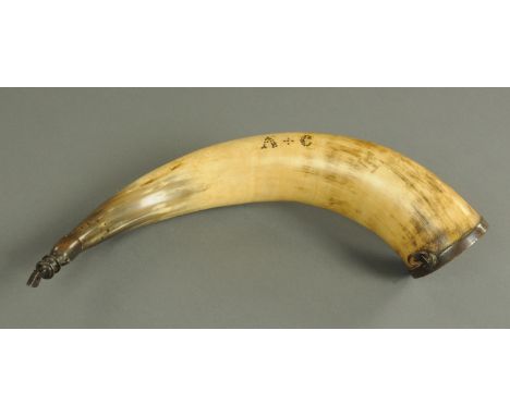 A horn powder flask, 19th century, with metal mounts and pique work decoration, include initials A.C. 40 cm.