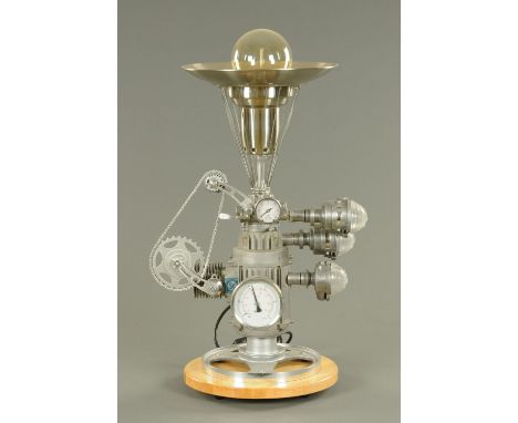 A Steam Punk inspired uplighter table lamp.  Height 65 cm excluding bulb.   CONDITION REPORT:  This item is of very recent co