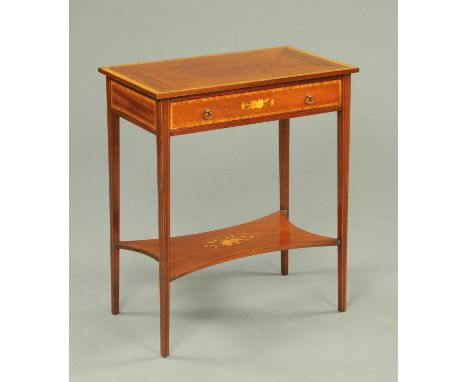 An Edwardian inlaid mahogany side table, fitted with a single drawer, and raised on tapered legs of square section with low s