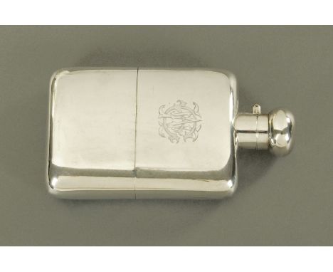 A silver hip flask, Deakin & Francis Ltd., Birmingham 1900, of slightly curved form and with engraved monogram "WE", also eng