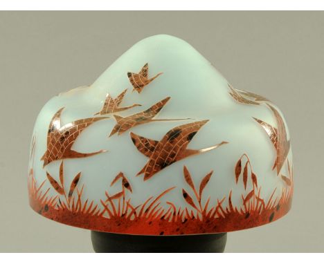 A French Galle style glass table lamp shade, 20th century, signed "Charder", decorated with flying geese above a reed and gra