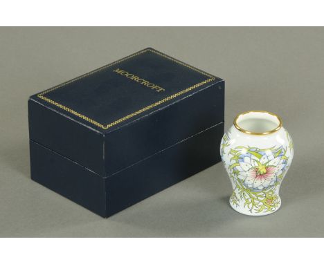 A miniature Moorcroft "Enamel Love in a Mist" vase, dated 98, designed by Rachel Bishop, printed marks, height 6.5 cm, in ori