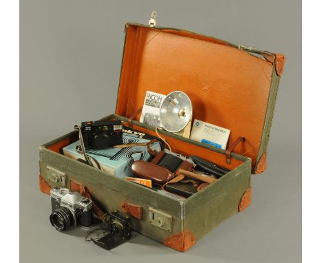 A Voigtlander Vito II Prinzflex Super TTL camera, other cameras and accessories, all within a canvas and leather bound suitca