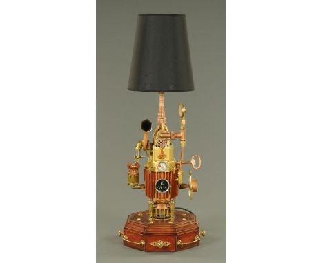 A Steam Punk inspired table lamp, fitted with gauges and fans and on an octagonal stained wood base with brass handles.  Heig