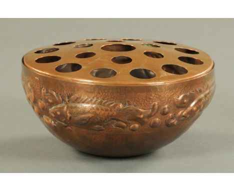 Newlyn School hand beaten copper rose bowl, late 19th/early 20th century, decorated with a band of stylised fish against a pl