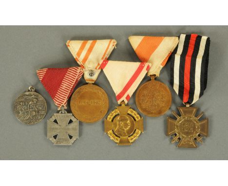 Five Great War Austrian Army medals, and a Second World War fob commemorating the Normandy Landings.