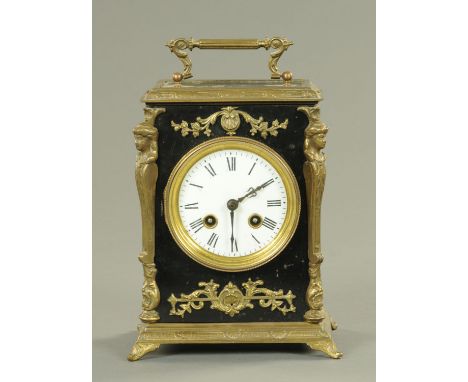 An Edwardian brass mounted mantle clock, in ebonised case, with two-train spring driven striking movement.  Height excluding 