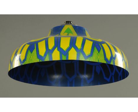 A blue plastic psychedelic light shade, early 1970's, coloured in yellow and green inverted hearts, stylised clouds and blade