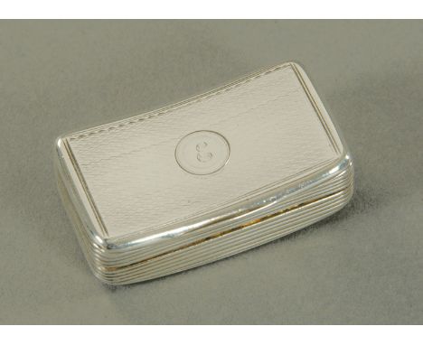 A silver snuff box, William Eaton, London 1820, of slightly bowed rectangular form, with engine turned decoration, a cartouch