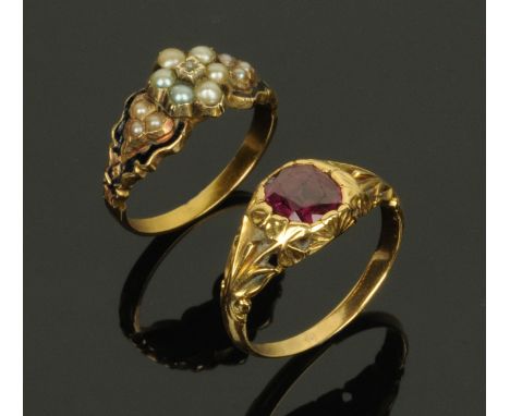 A 19th century gold in memoriam ring, with a small central diamond chip surrounded by seed pearls and with enamel decorated s