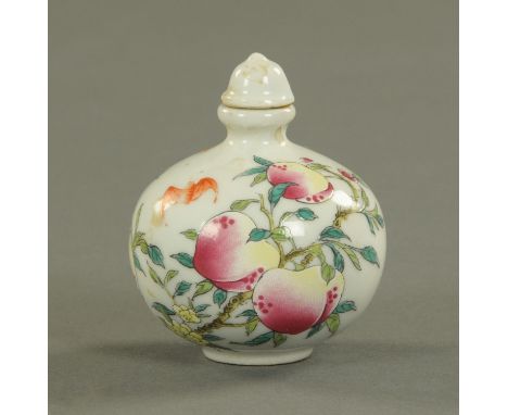 A small Chinese perfume bottle, decorated with peaches and with Artemisa mark.  Height 74 mm.    CONDITION REPORT:  The base 