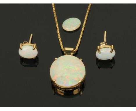 A circular opal pendant, (14 mm diameter), mounted in a 9 ct gold mount with matching necklet, a pair of gold metal mounted o