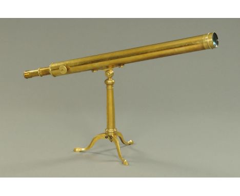 A Victorian brass telescope on tripod stand, single draw.  Length extended 97 cm, objective lens diameter 2.5 inches, height 