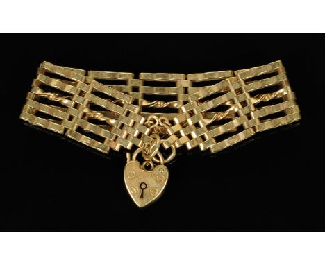 A 9 ct gold gate link bracelet with padlock clasp. CONDITION REPORT: Weight 23 grams.