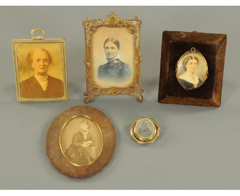 A French gilt metal photograph frame, 19th century with easel support, a pinch beck reversible memorial locket, a mounted loc