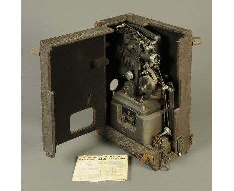 The Ampro precision projector, circa 1930, in a matt black finish with chrome fitments and with original instruction leaflet,