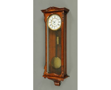 A Victorian rosewood single weight Vienna regulator wall clock.  Width 32.5 cm, height 98 cm (see illustration).   CONDITION 
