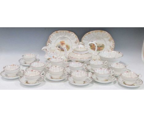 A William IV tea service for twelve with a similar teapot, all decorated with rustic scenesrubbing to the gilding on the rims