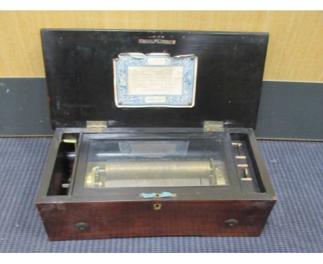 A 19th century musical box, 18cm cylinder playing 6 airs, one comb tooth broken, crank wind, plain box, 37.5cm wide, (mechani