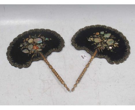 A pair of 19th century Papier-mâché and mother of pearl face screens with turned wood handle