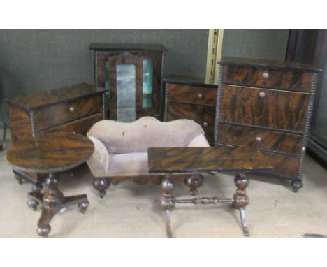 Suite of Victorian simulated or faux rosewood dolls house furniture with bobbin turned details, to include sofa table, chest 