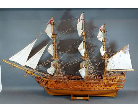A scale model of H.M.S Victory 1805, upon a stand, 69cms tall 