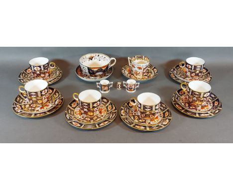 A set of six Royal Crown Derby Imari pattern tea cups and saucers, together with matching side plates, two Derby cups and sau