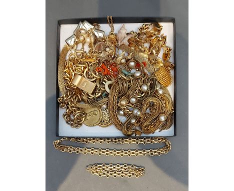 A gold plated necklace with matching bracelet by Christian Dior together with a collection of gold plated jewellery 