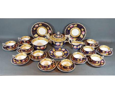 A 19th Century tea service comprising cups, saucers, plates and teapot all hand painted with summer flowers and highlighted w