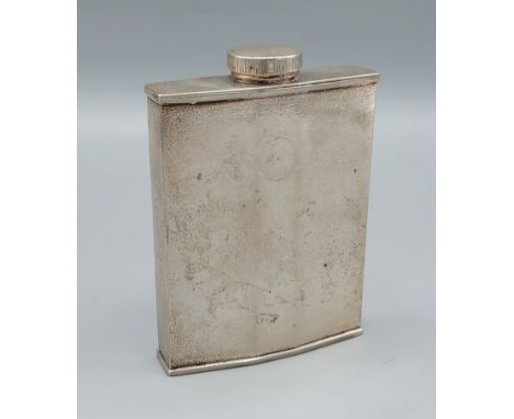 A Chinese white metal powder flask, Hung Chong &amp; Co mark to base, 10cms tall 