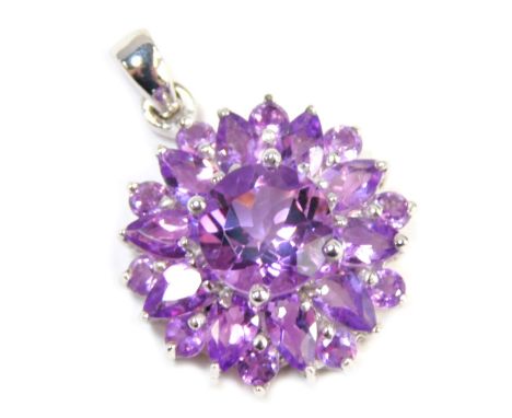 A Coloured Rocks amethyst pendant, formed as a floral cluster set with a central round brilliant cut stone surrounded by vari