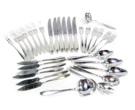A 1920s WMF cutlery set, comprising six dinner knives and forks, six fish knives and forks, three serving spoons, salad, frui