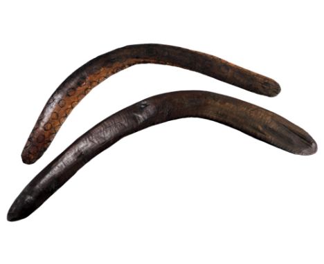 Two carved wooden aboriginal boomerangs, 44cm and 50cm diameter. 
