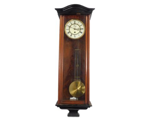 A mahogany and ebonised wall clock, the circular cream enamel dial bearing Roman numerals, subsidiary seconds, thirty hour, w