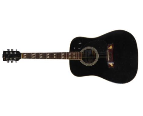 A Lorenzo acoustic guitar, Model No N1917A. For Fletcher, Coppock &amp; Newman.