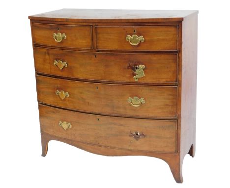 A George III mahogany bow front chest, of two short over three long graduated drawers, raised on bracket feet, 104cm high, 10