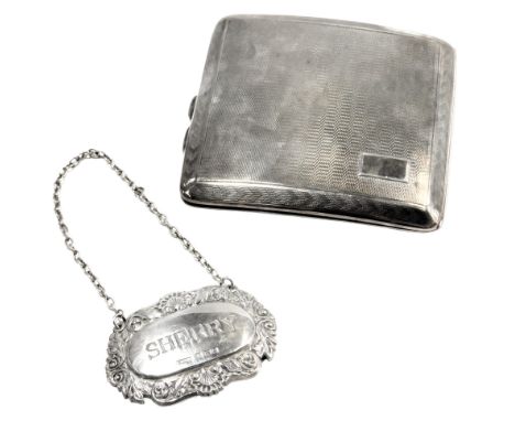A George V silver cigarette case, of concave form, with engine engraved decoration and vacant cartouche, Birmingham 1928, 3.4